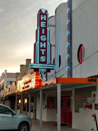 Houston Heights Theater vintage neon sign at dusk